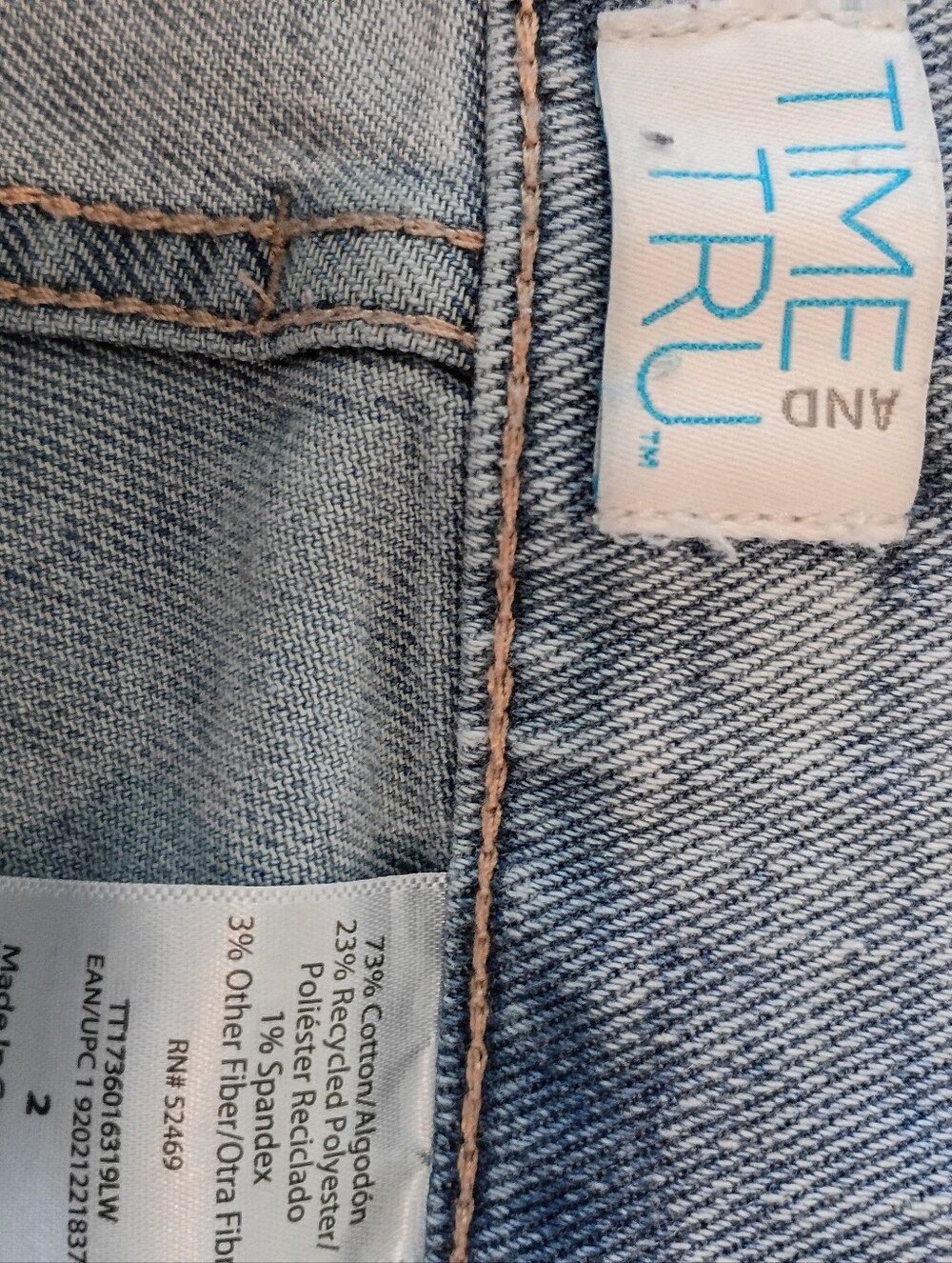 Time and Tru Light Wash Denim Jeans with Tan Stitching